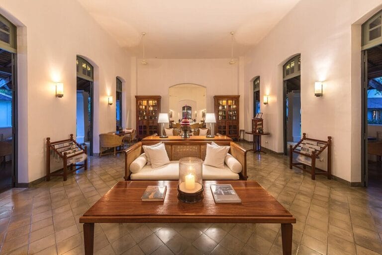 Clean, well‑lit living room interior used as a neutral header image for household pest guides
